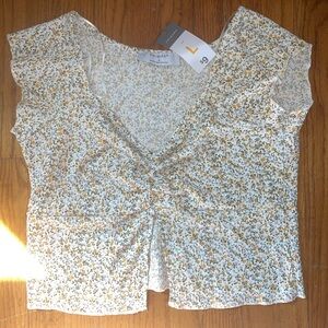 Yellow and white flower top